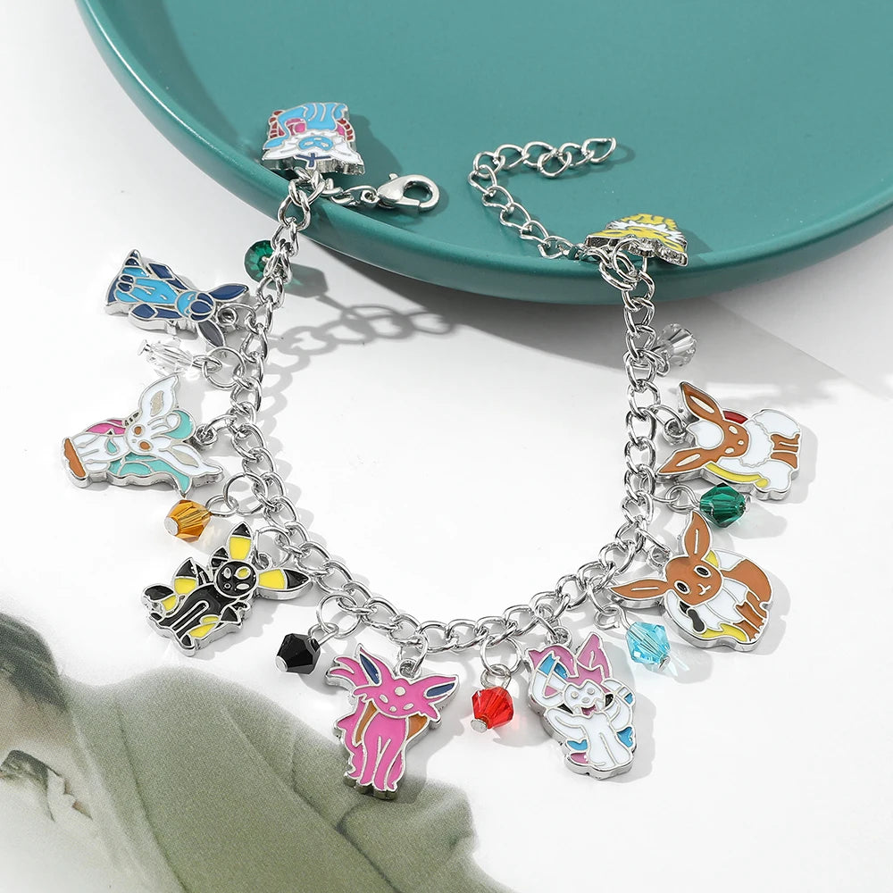 Pulsera de Anime Pokemon, pulseras colgantes de Eevee de dibujos animados bonitos, brazalete con abalorio esmaltado de Metal, joyería de moda para mujer, regalos de cadena de mano